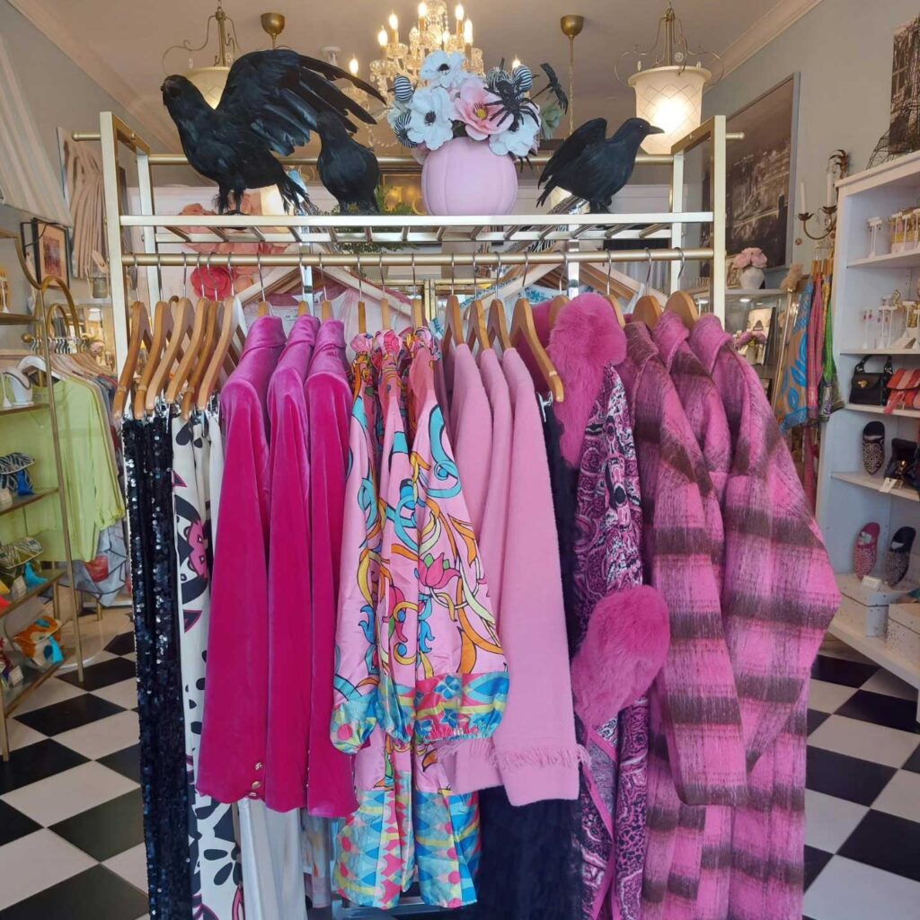 rack of pink tops and clothing in Muguette Renee