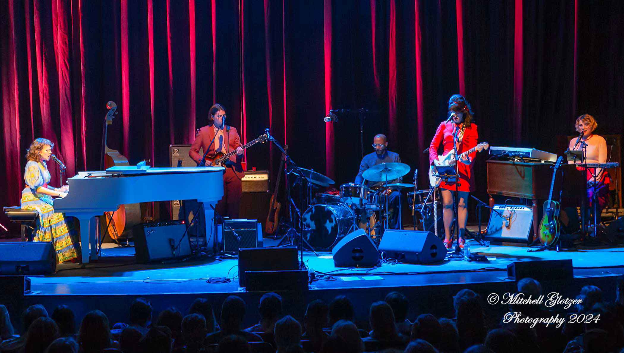 Norah Jones performs with a band at Uptown Theatre